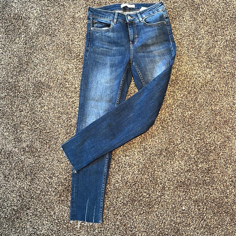 Never worn distressed Zara skinny jeans